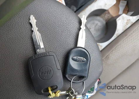 2009 Ford Focus S из США, поврежденный, VIN 1FAHP34N69W118060